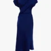 Asymmetrisk klänning med vridning i ljus indigo Asymmetrisk klänning med vridning i ljus indigo