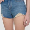 Distressed shorts i mellanblå tvätt Distressed shorts i mellanblå tvätt