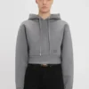 Kort, strukturerad hoodie i gråmelerat Kort, strukturerad hoodie i gråmelerat