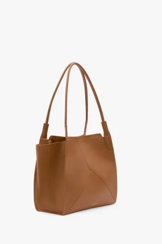 The Victoria-toteväska i brunt läder